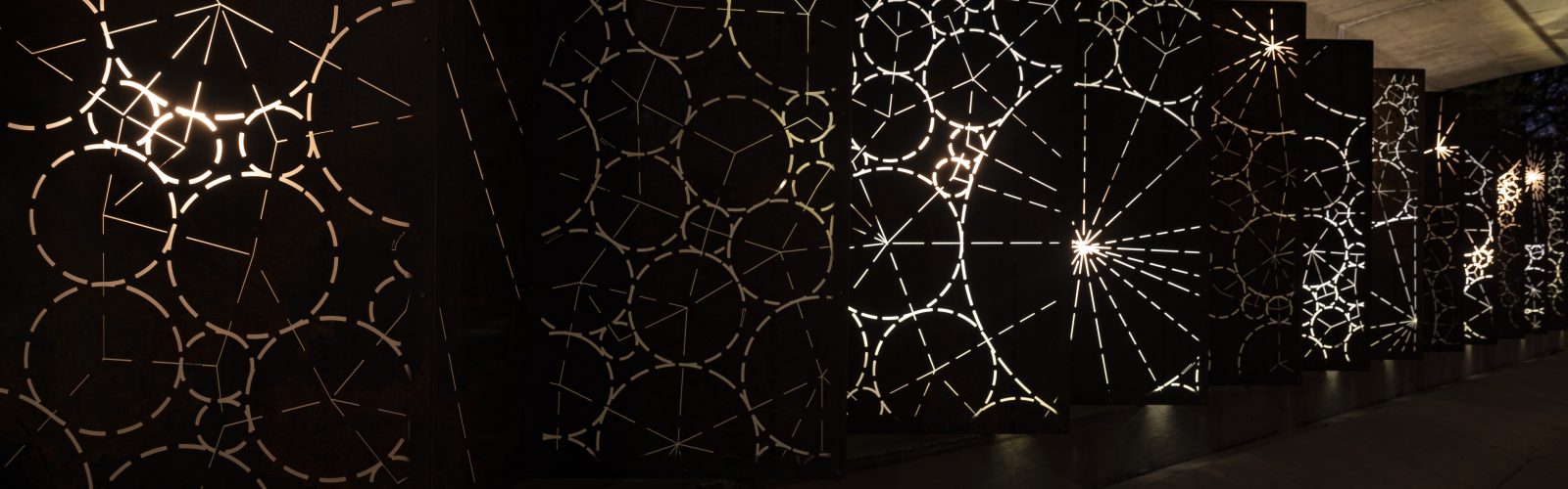 ‘Shift’ a public art installation comprised of two 70-foot metal light sculptures.
